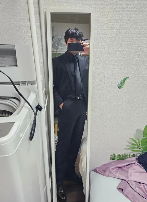 Black suit as a casual outfit