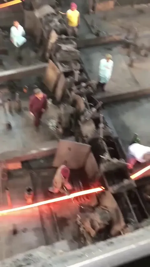 Workers working in a Factory with no safety