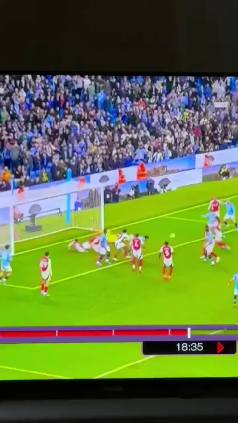 Haaland throws the ball at Gabriel after they score