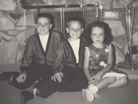 My mom's annual Christmas cards included a portrait of my big brothers and me. 1953-1959