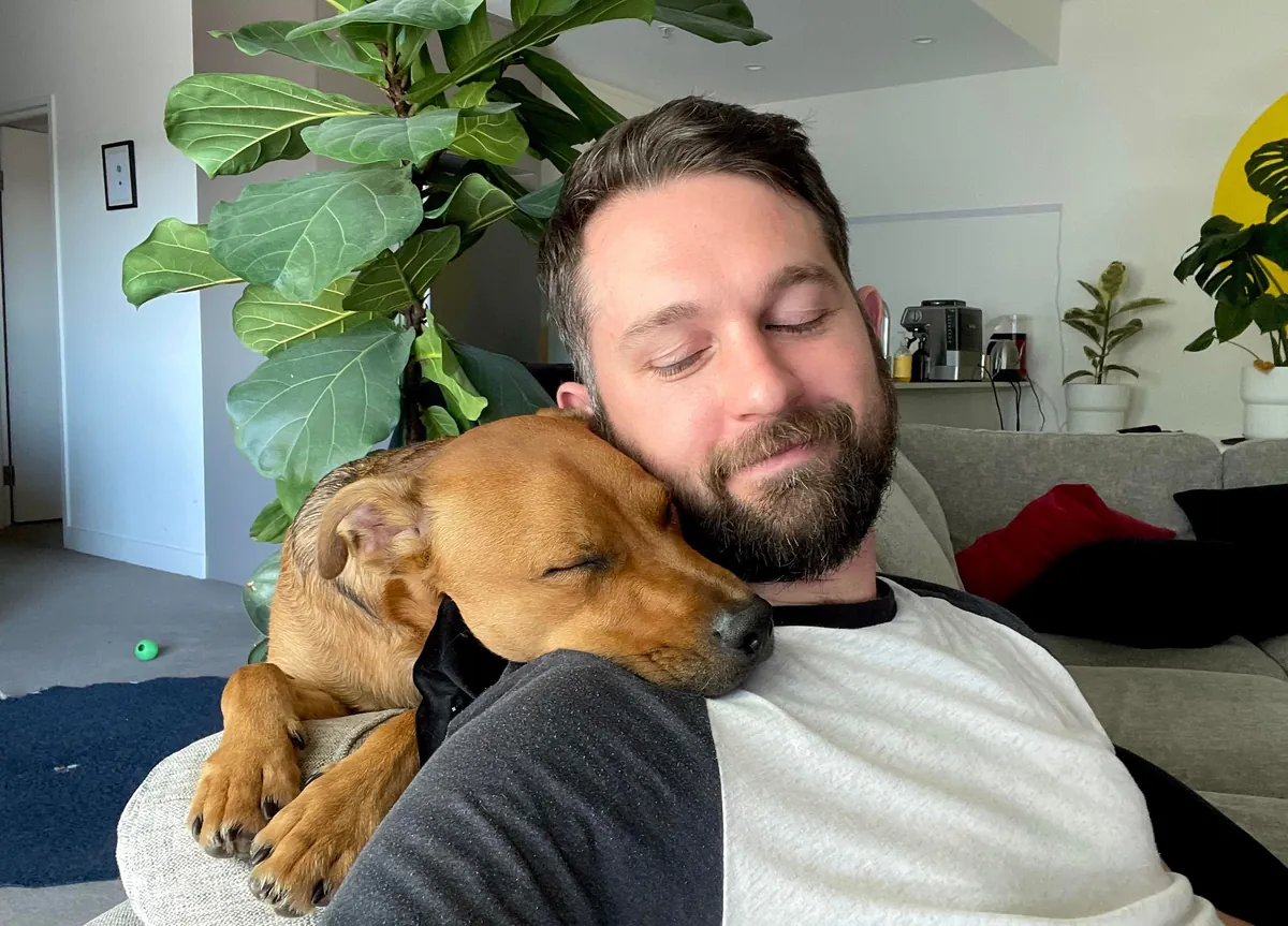 This is my cuddle monster Hector. His chin is on my shoulder as I post this