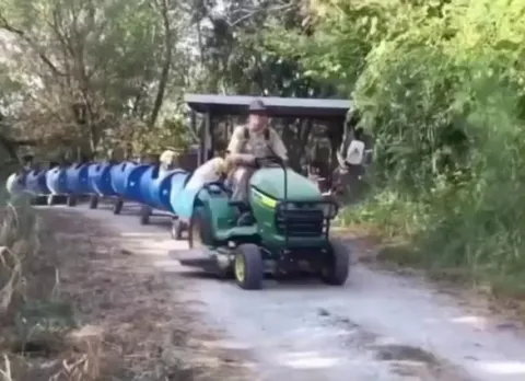 This 80-year-old retiree noticed that people were abandoning their dogs near his farm, so he took them in and built a train to take them out for rides.
