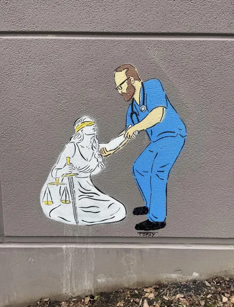 Mural of Alex Pretti in Seattle, Washington. Artwork by Topsy.