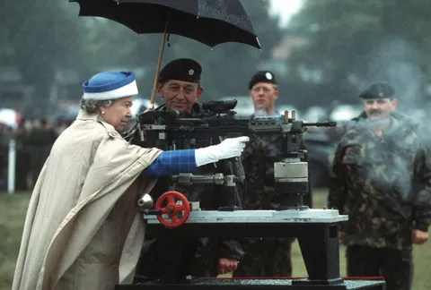 Queen Elizabeth Fires an SA 80 rifle whilst visiting troops in 1993
