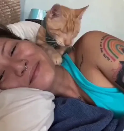 Blind cat loves to snuggle with the owner who rescued her as a kitten..🐈🐾❤️
