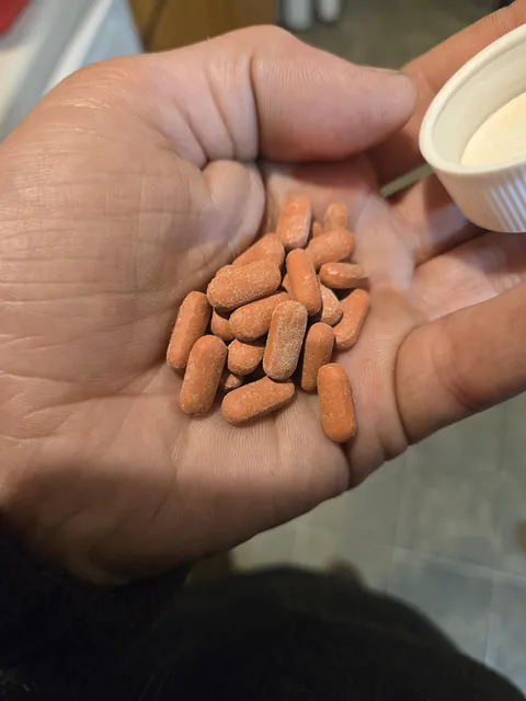 Expired ibuprofen formed little crystals.