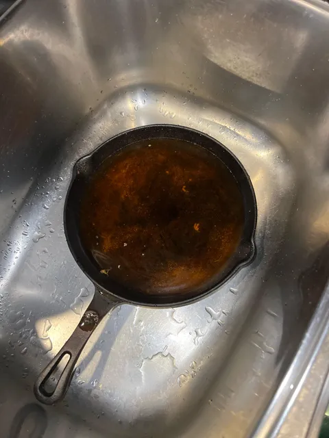 My parents soak our cast-iron pan when we’re out of town