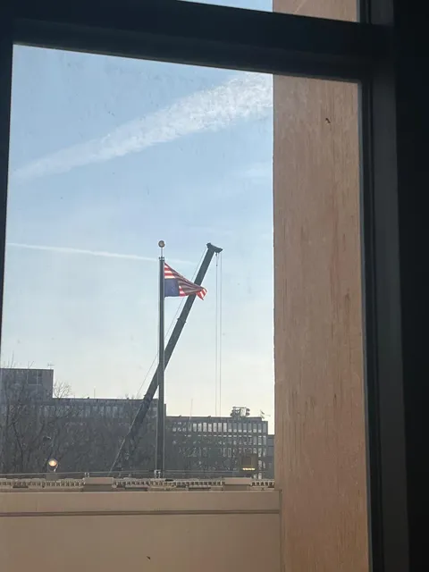 Flag flown upside down as sign of distress outside of US State Department building