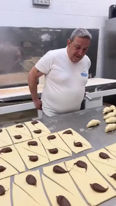 Folding croissants with chocolate filling
