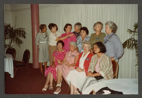 Photos of a group of WASP (Women Airforce Service Pilots) veterans posing together at their 1984 reunion in San Diego, CA