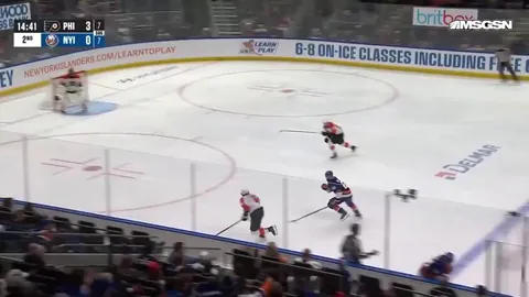 Kyle Palmieri of the New York Islanders tears his ACL then strips the puck to set up a goal