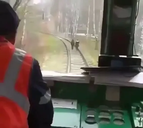 Getting snuck up on by a train.