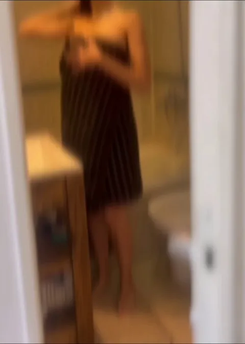 My neighbor came home and filmed me in the bathroom