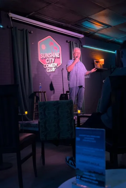 My clever dad was on vacation and convinced a comedy club to give him stage time.