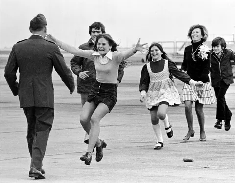After spending more than five years in a North Vietnamese camp, Lt. Col. Robert L. Stirm is reunited with his family at Travis AFB, March 13, 1973.