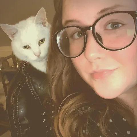 My cat sitting on the back of my chair makes it look like she’s wearing a leather jacket
