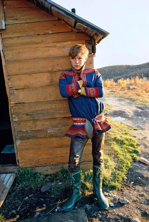 Nils Johan Mienna, a young Sámi boy in Norway, strikes a pose for National Geographic in 1977