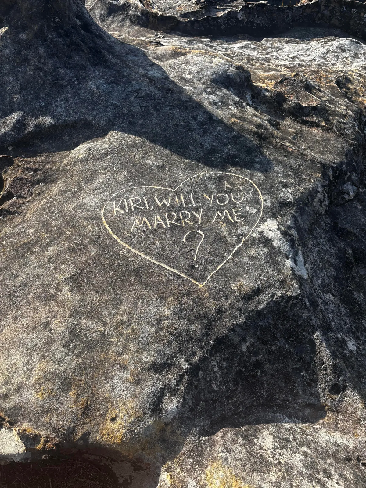Etching your proposal into ancient rocks at a popular look out in the Blue Mountains