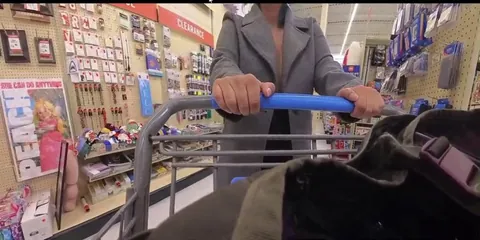 Flashing huge tits while shopping