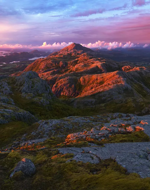 The whole day was grey, but got magical real quick just before sunset. Worth sticking around a top a mountain for! Norway during late July sunset [OC] [1973x2500]