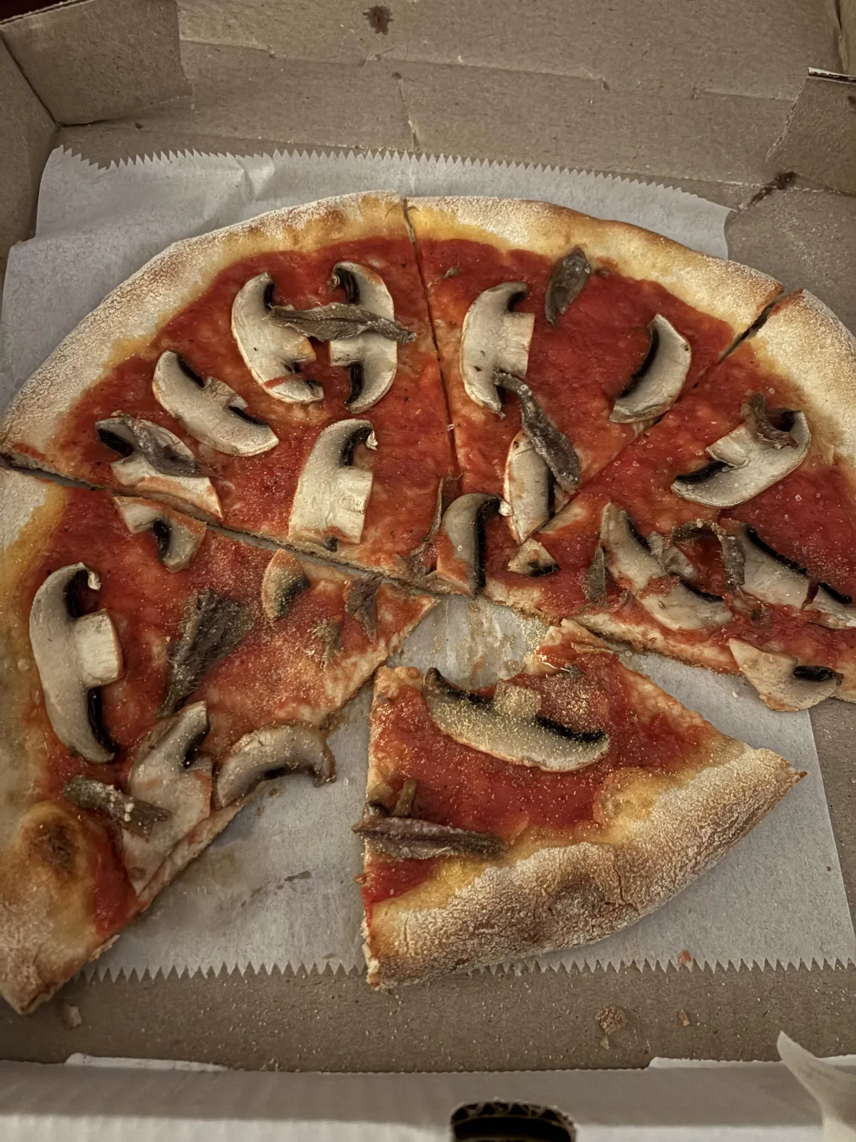 Got high, ordered a personal pizza with anchovies and mushrooms, forgot to add cheese