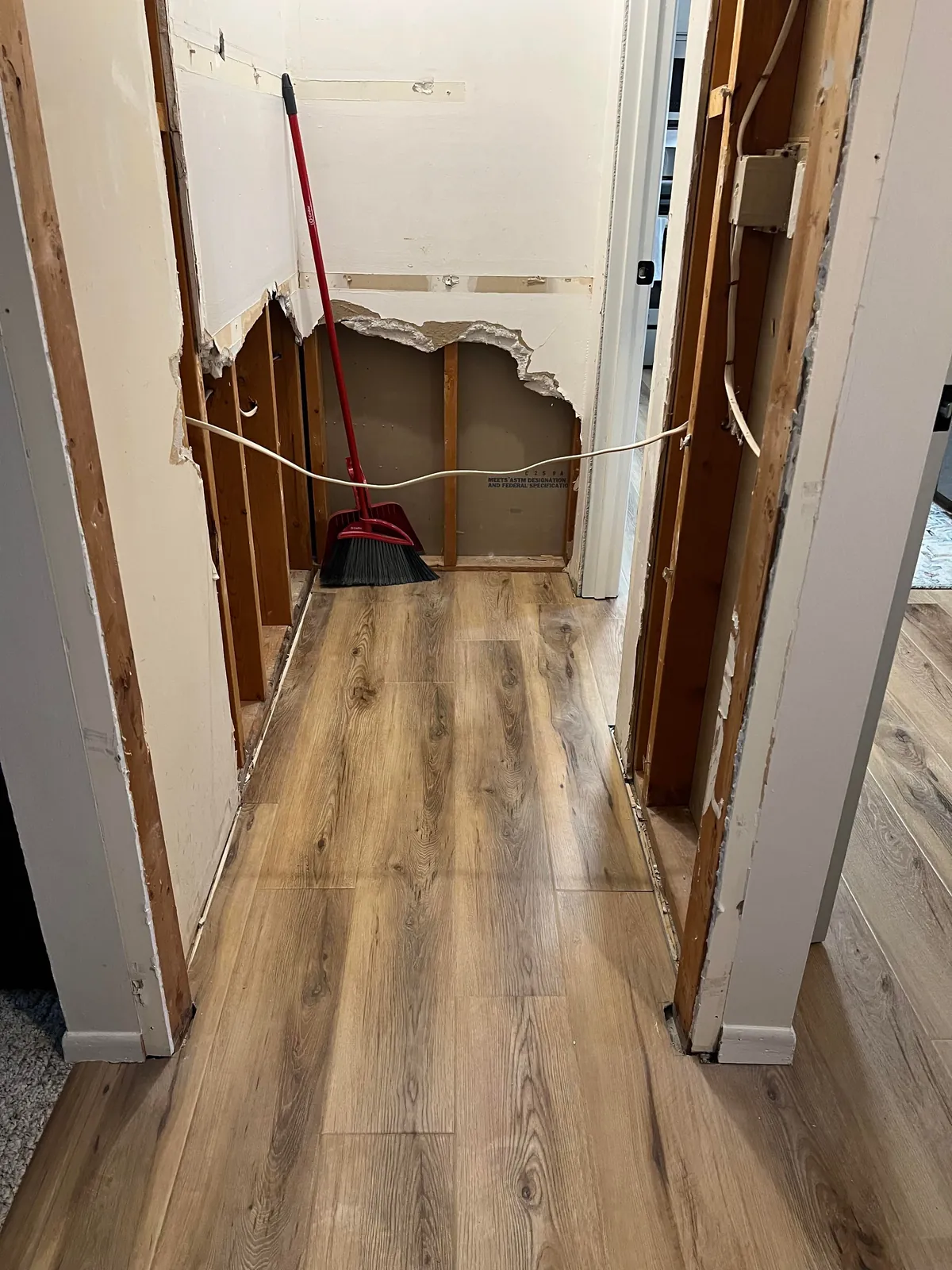 Reclaimed unused coat closet for pantry expansion