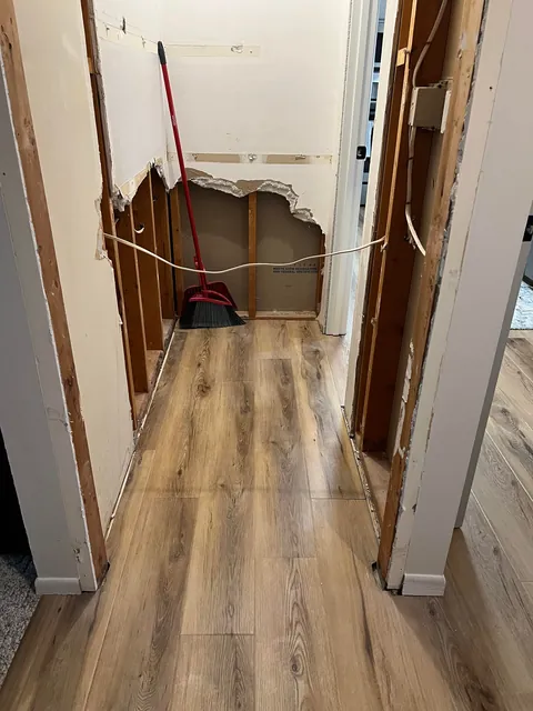 Reclaimed unused coat closet for pantry expansion