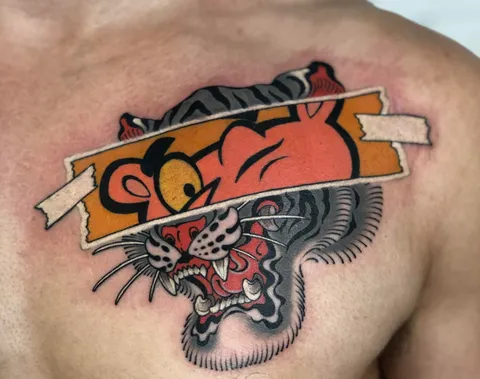 Fresh Pink Panther/ Tiger on the chest by Manh Huynh at Freedom Inks, Ho Chi Minh City, Vietnam