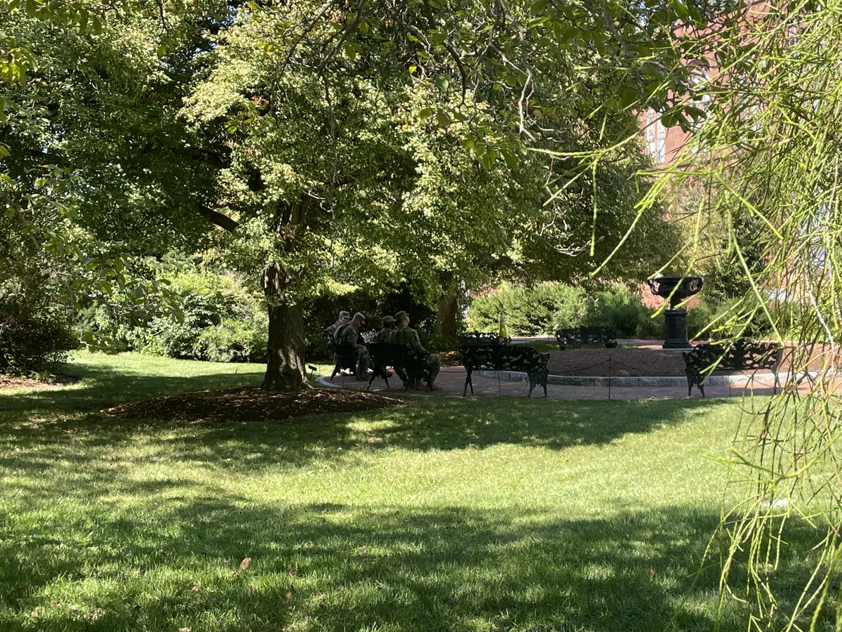 OC National Guard sitting in the Smithsonian garden.