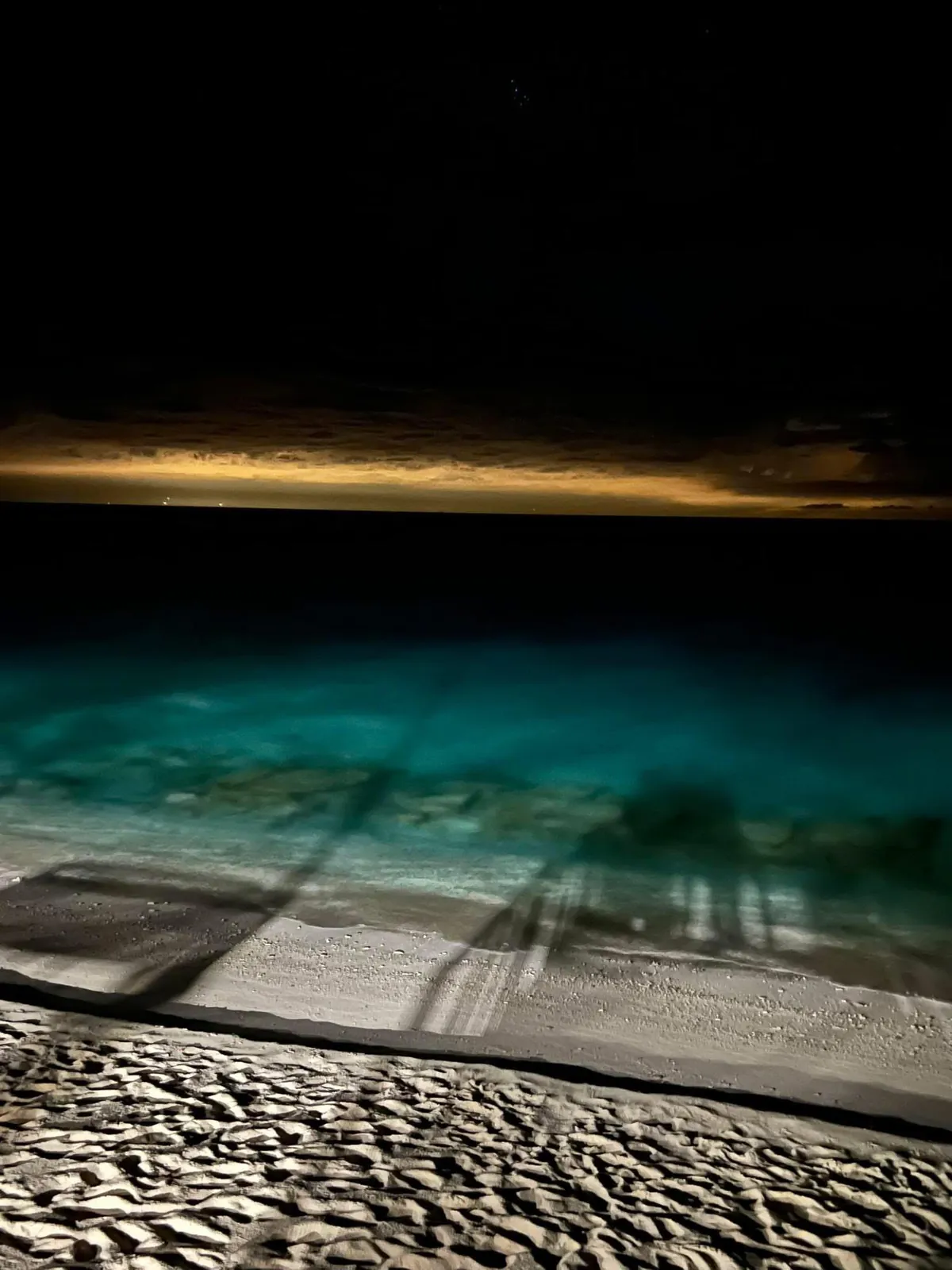 The Miami city lights seen from Bimini in Bahamas.
