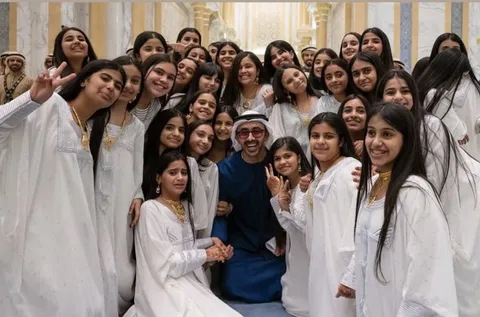 UAE’s Foreign Minister Sheikh Abdullah bin Zayed posing with the girls who welcomed President Trump