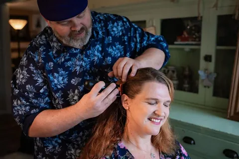 Shaving my head after week one of chemo