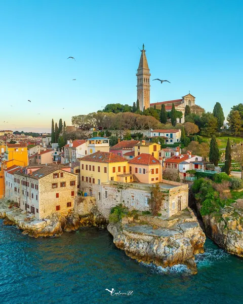 18th-century Baroque Basilica of St. Euphemia and the 17th-century bell tower on the hilltop of old town Rovinj on the north Adriatic Sea, Istria County, west Croatia.