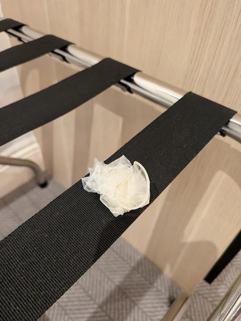 The first thing I saw after checking into my hotel room was a used condom on display.