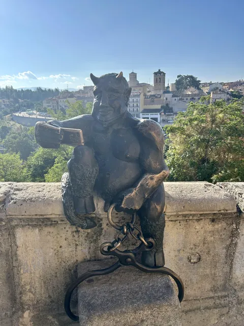 In the city of Segovia (Spain) there is the statue of a devil taking a selfie...
