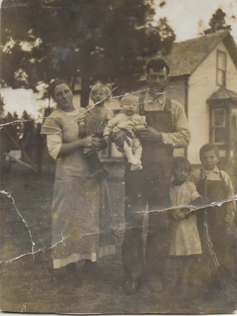 My grandmother in her mother's arm. 1914