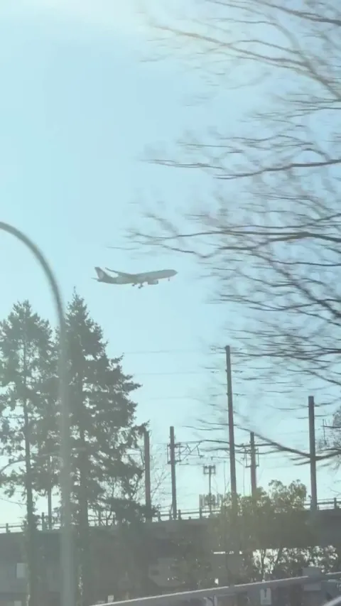 Parallax effect: the plane is moving fast, but its distance hides the shift so it looks still