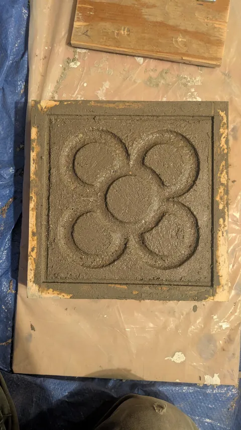 Created the Barcelona Panot de Flor paver for a small connecting walkway. Many hours of labor for 21 concrete tiles.