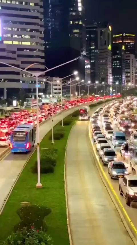 Traffic in Jakarta, Indonesia. Public transport is not impacted thanks to strictly segregated priority lanes dedicated to buses, taxis and coaches