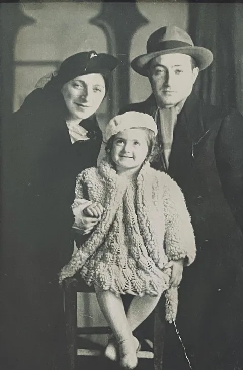 My great-grandparents and their first daughter, c. 1936. I adore this picture.