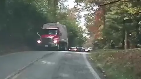 Impatient idiot passed the waiting cars in the oncoming lane, inched up on the man in the road, then dangerously sped around [oc]