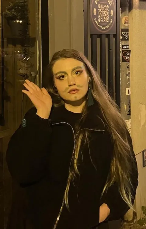 I asked ChatGPT to make my photo better, it did this: