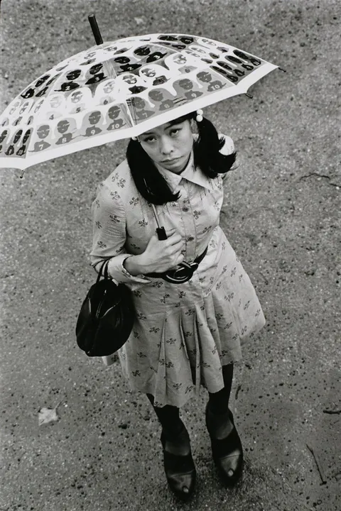 In 1974, Masahisa Fukase photographed his wife, Yōko Wanibe, every morning from the window of their apartment in Tokyo as she left for work.