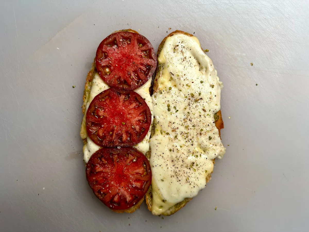 Mozzarella, tomato, and pesto melt on [homemade] bread