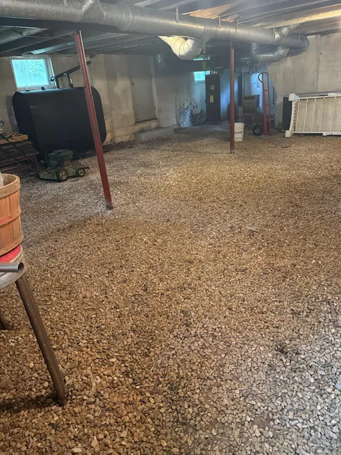 Build a deck on a gravel basement floor?