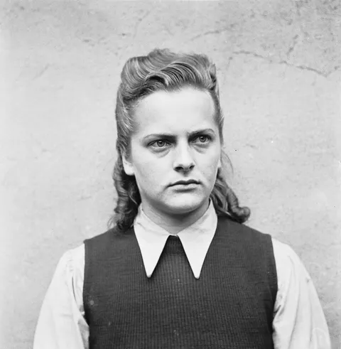 Irma Grese, a Nazi concentration camp guard during World War II who earned the infamous nicknames "Hyena of Auschwitz" and "Witch of Bergen-Belsen" due to numerous accusations of cruelty and brutality,  1945. 