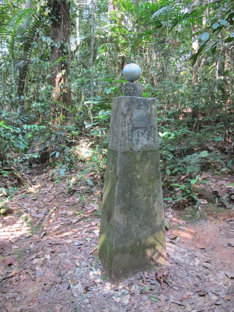 While hiking an isolated jungle trail in the Amazon, we came across this post marking the equator.