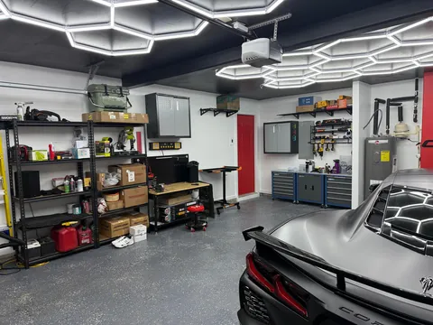 From depression-fueled garbage dump to bat cave and shop. Photos taken 1 month apart.