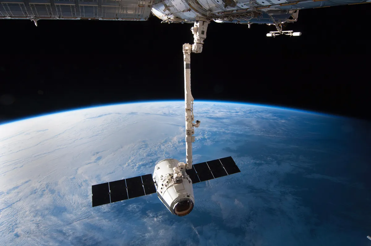 12 years ago I took this photo when my crew and I captured the first SpaceX Dragon aboard ISS. More details in comments.