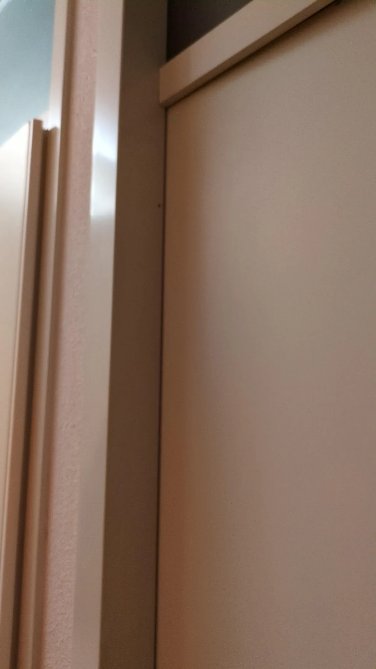 Bedroom door blocked from the inside with a fallen coffee table - what can i try?